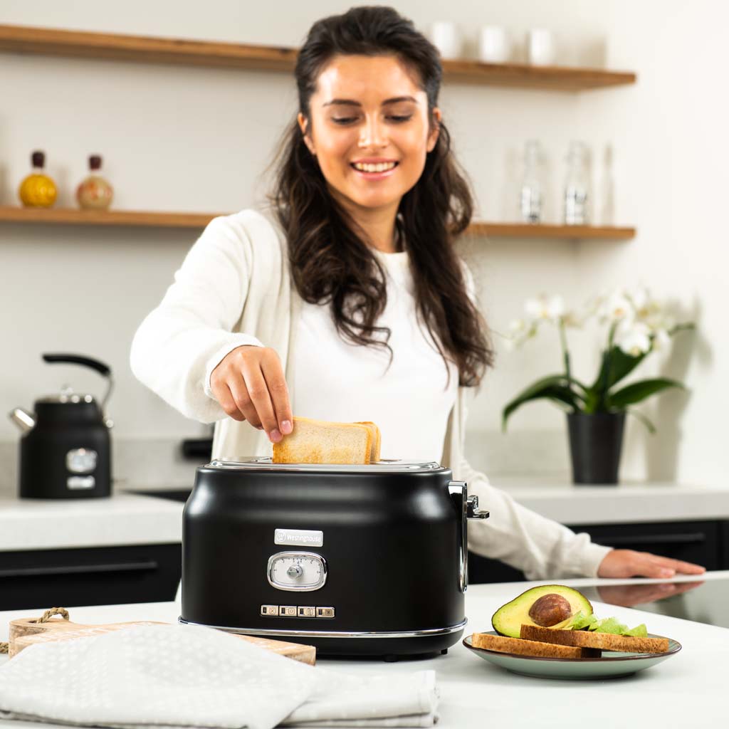 https://cdn.shopify.com/s/files/1/0676/9999/8920/files/WKTTB857BK-Retro-2-Slice-Toaster-6.jpg?v=1747810389
