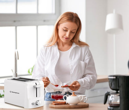 https://cdn.shopify.com/s/files/1/0676/9999/8920/files/White-body-toaster-4.jpg?v=1750336042